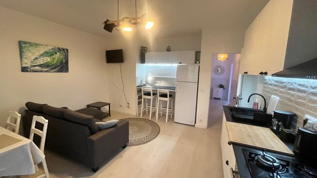 accommodation of bed and couch at Peniche Surf Lodge