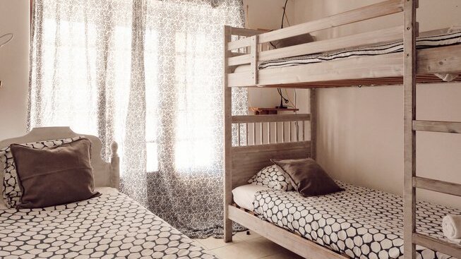 bunk beds and bed at Boa Onda Guesthouse