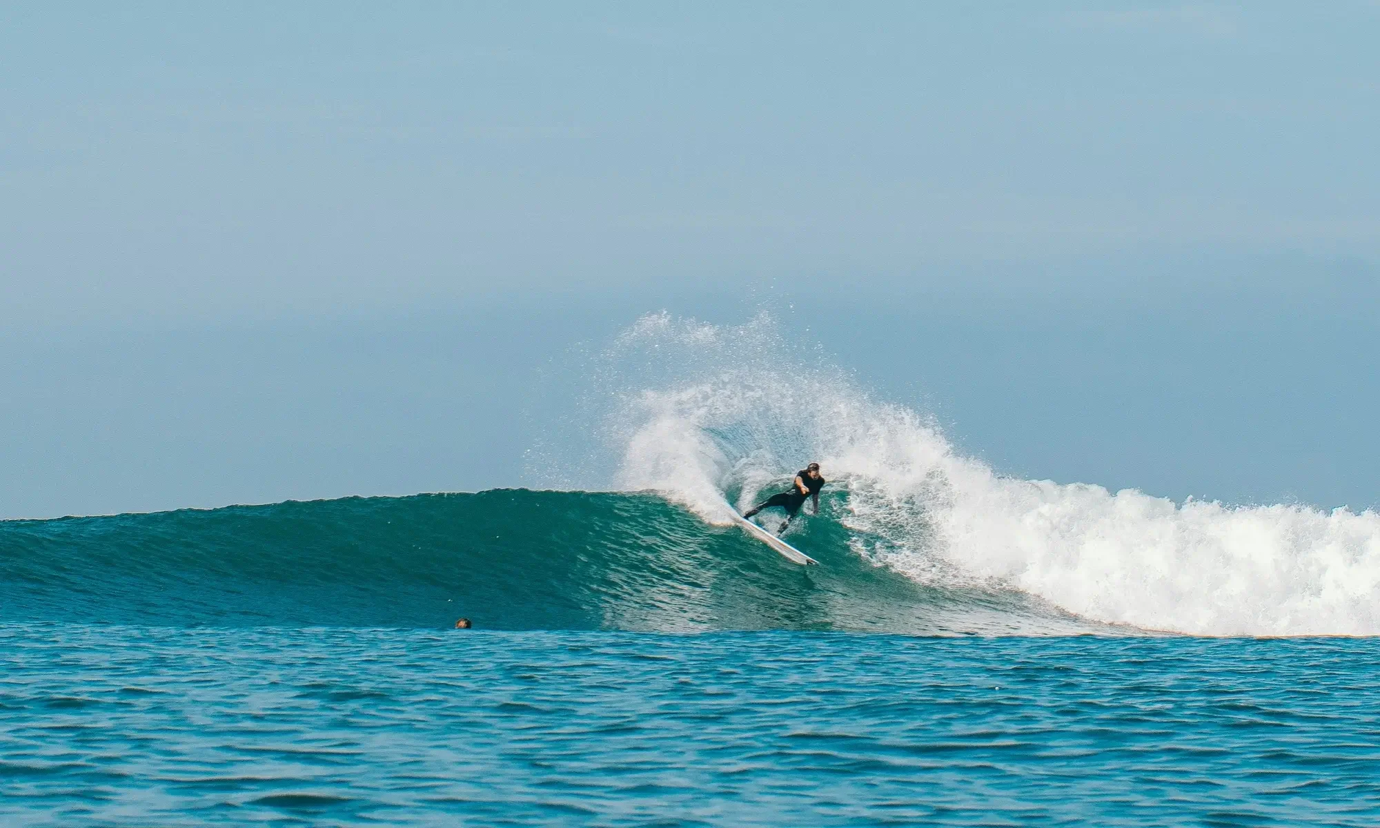 Home Page Hero Image - guy surfing-2