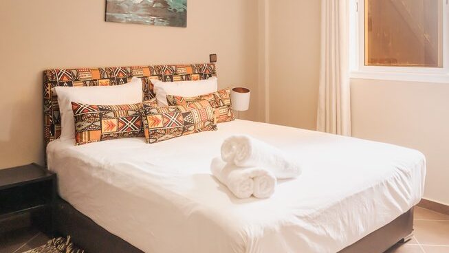 double bed at The Surf Hotel Morocco