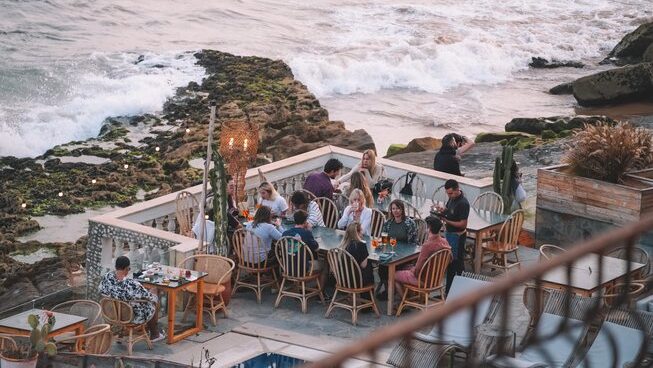 people enjoying a drink at Dfrost Almugar Taghazout Surf & Yoga Luxury Retreat