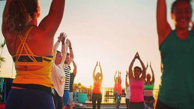 people practicing yoga at Crocro Surf House