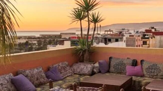 seating at Crocro Surf House with sunset